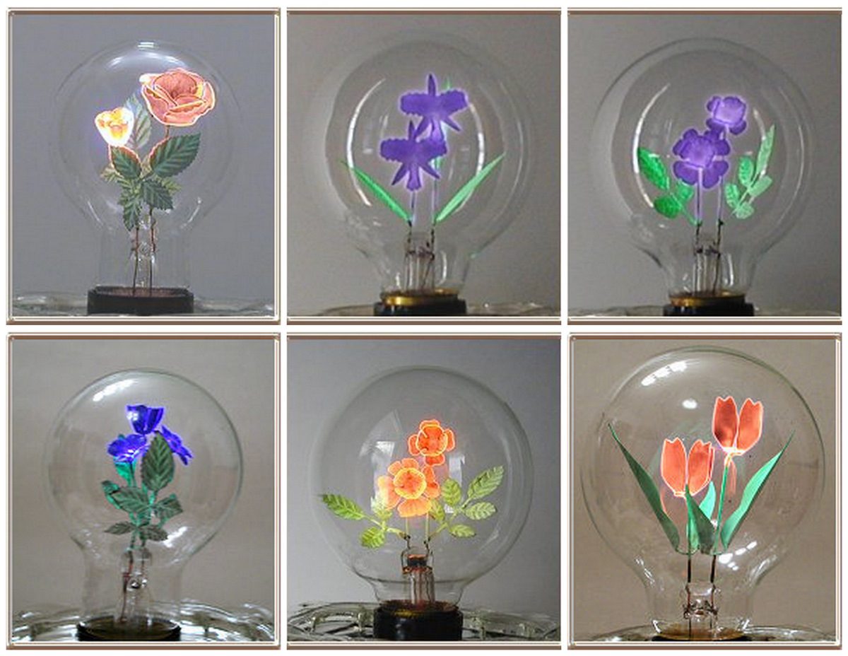 Six Aerolux flower bulbs, each lit by the glowing coating on a little metal figure inside. Not the one in the story.