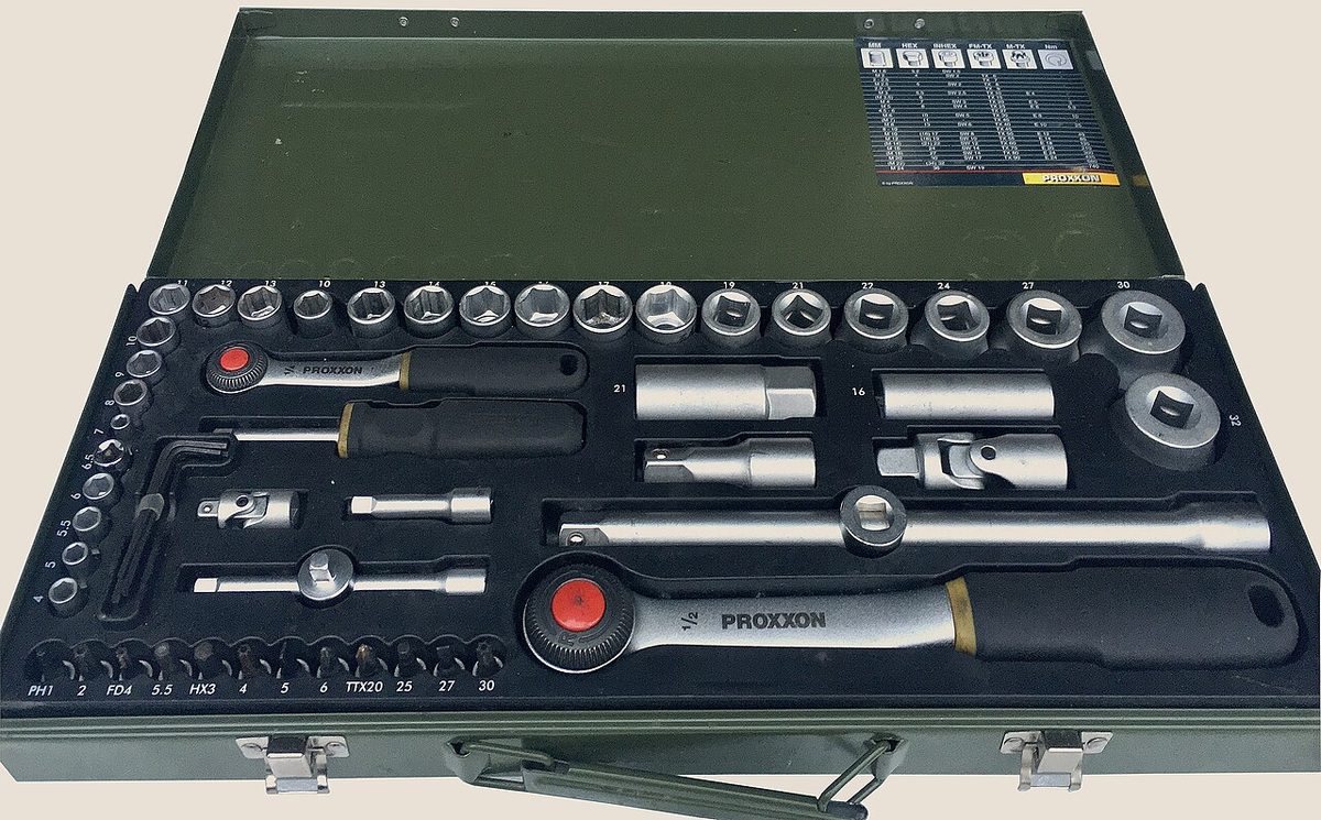 A modern socket set with two ratchets, every piece in its slot in a metal case. Not the set in the story.