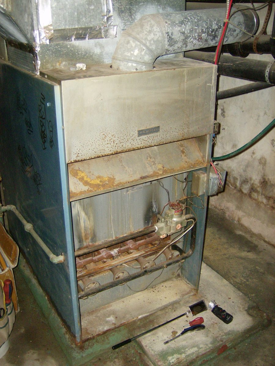 A 1960s McClary-Easy natural gas furnace in a Winnipeg basement. Not a Bryant, and not the one in the story.