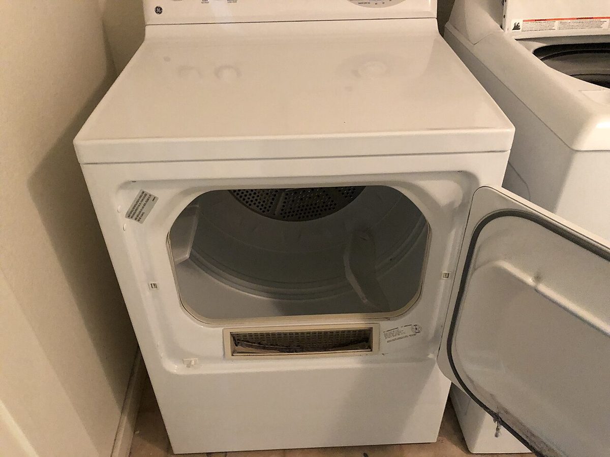 A General Electric electric dryer with its door open, photographed in 2018. Not the one in the story.