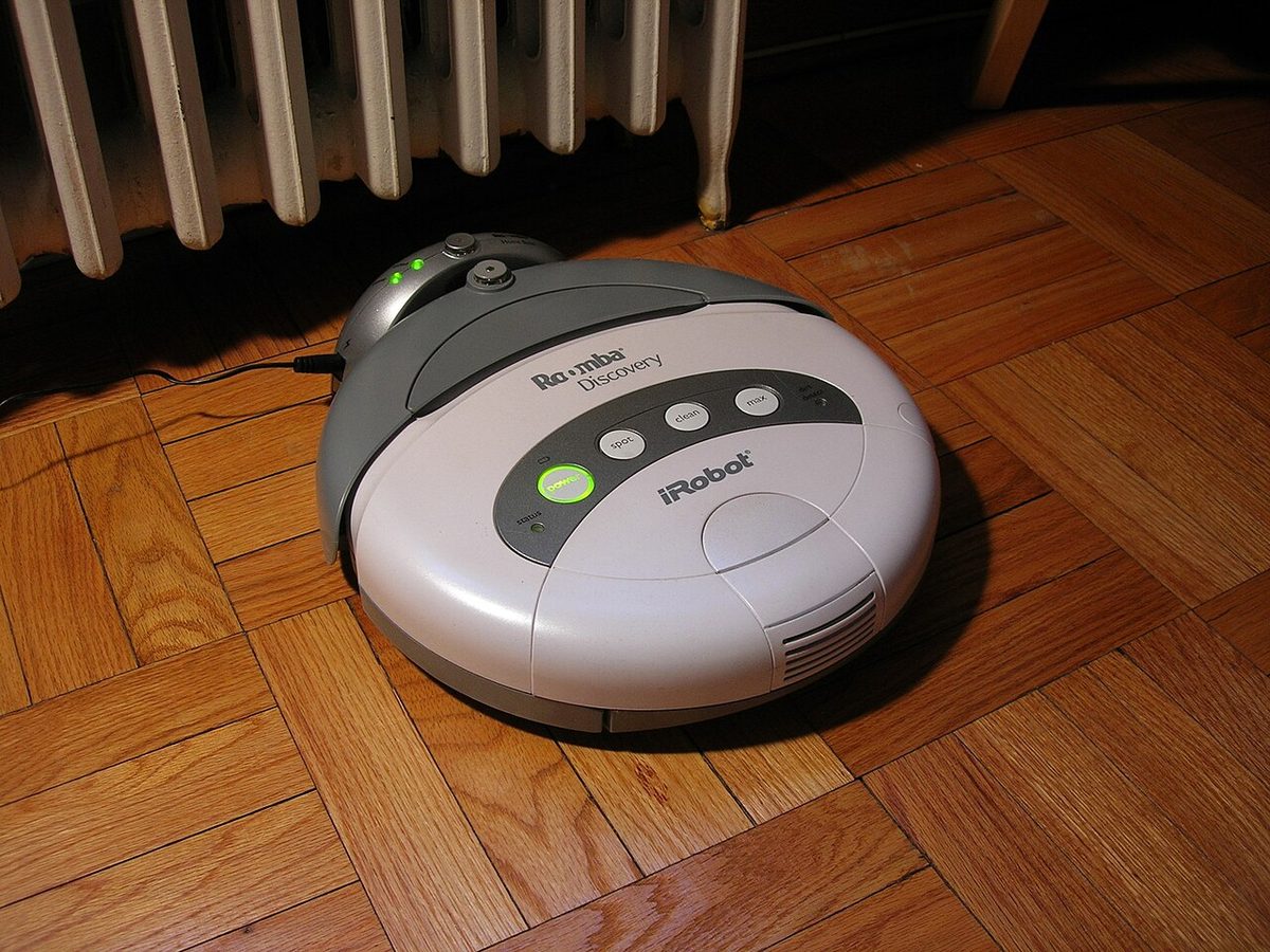 A Roomba Discovery back on its charging dock, photographed in 2006. Not the one in the story.